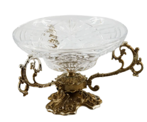 Fruit vase on a golden leg